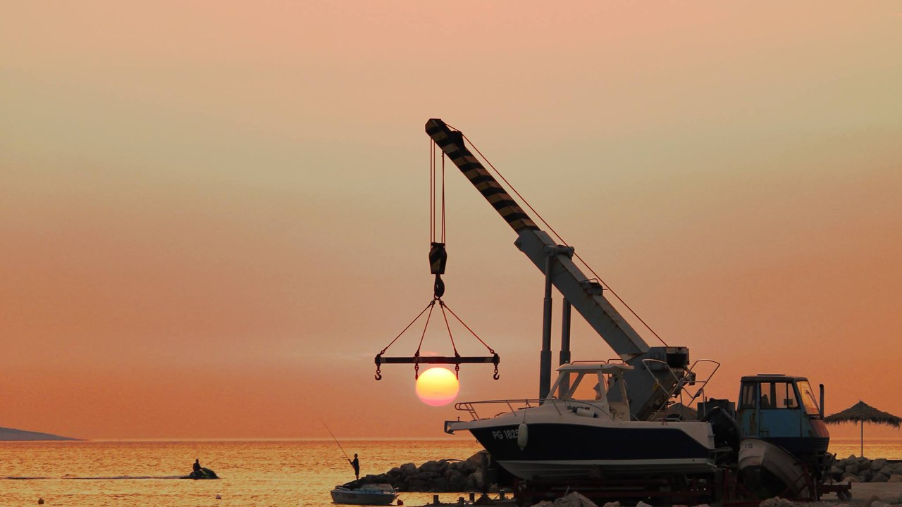 Sunset photography, crane and boat